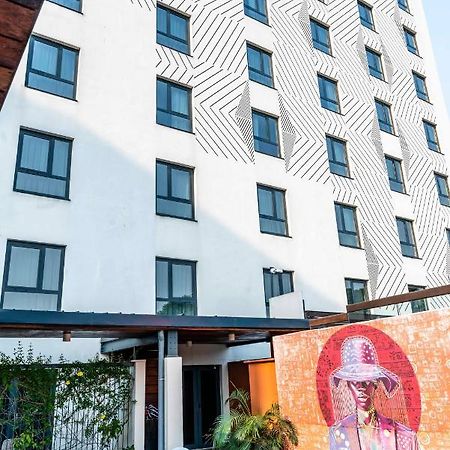 Onomo Hotel Дуала Экстерьер фото