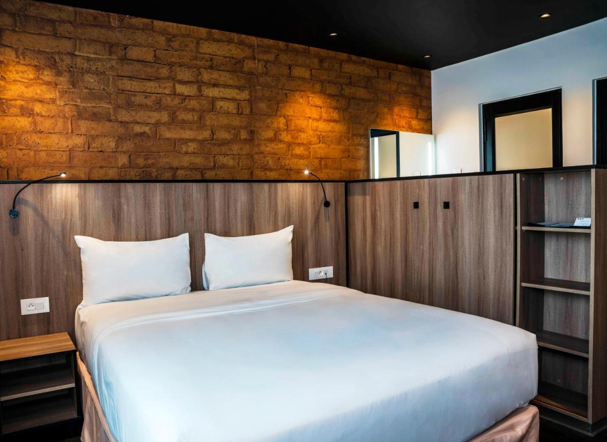 Onomo Hotel Дуала Экстерьер фото