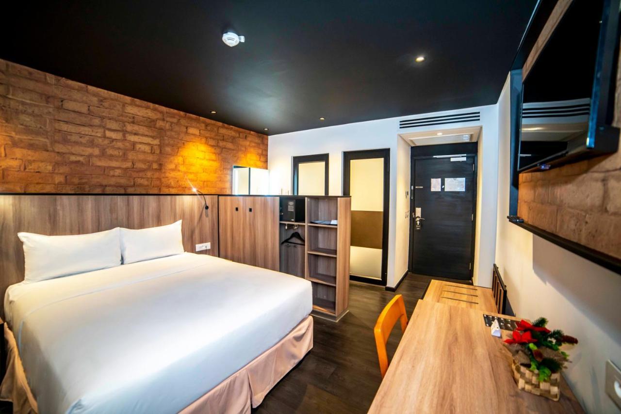 Onomo Hotel Дуала Экстерьер фото